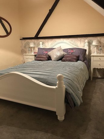 Imagen de la habitación del Hotel Dollydrops Cottage. Foto 2