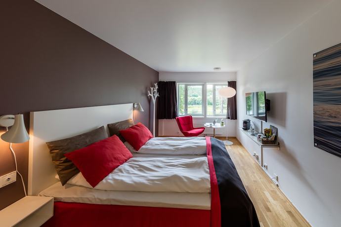 Imagen de la habitación del Hotel Dolmsundetl Hitra. Foto 2