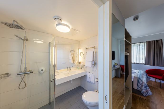 Imagen de la habitación del Hotel Dolmsundetl Hitra. Foto 4