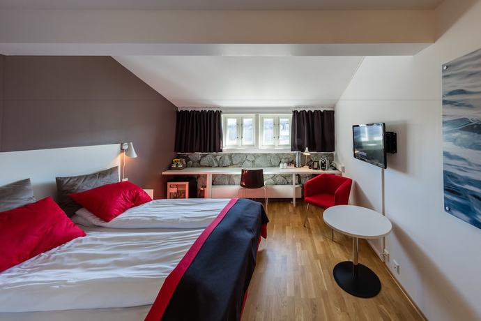 Imagen de la habitación del Hotel Dolmsundetl Hitra. Foto 6