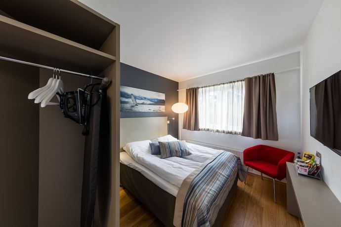 Imagen de la habitación del Hotel Dolmsundetl Hitra. Foto 7