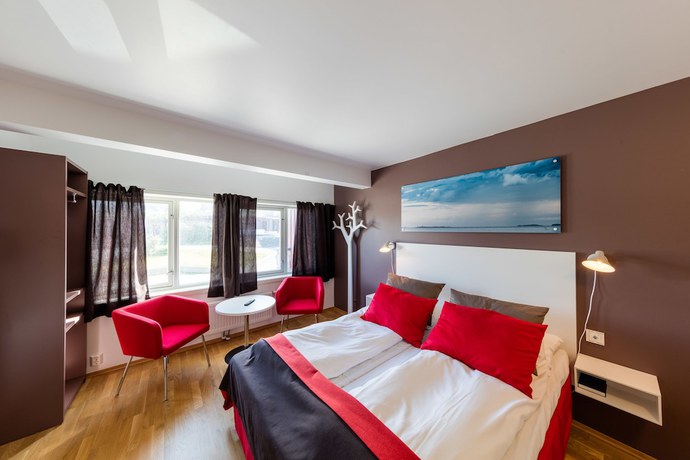 Imagen de la habitación del Hotel Dolmsundetl Hitra. Foto 8