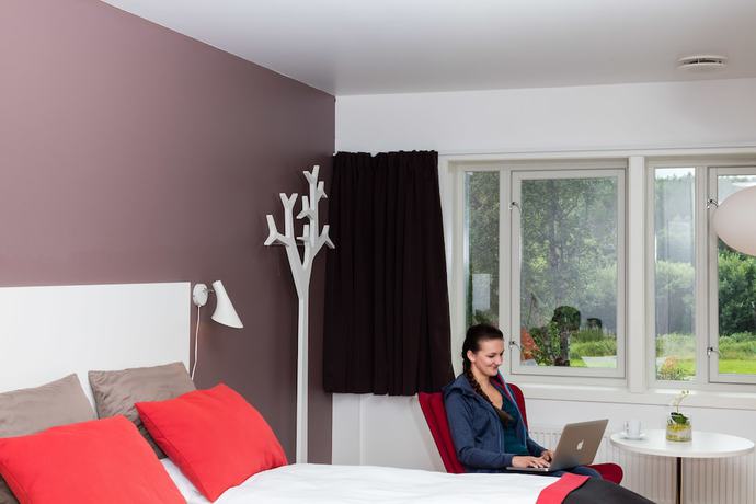 Imagen de la habitación del Hotel Dolmsundetl Hitra. Foto 11