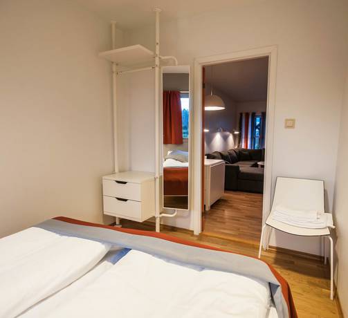 Imagen de la habitación del Hotel Dolmsundetl Hitra. Foto 12