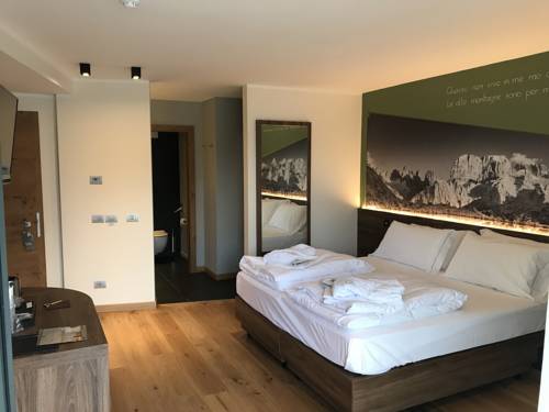 Imagen de la habitación del Hotel Dolomeet Boutique. Foto 10