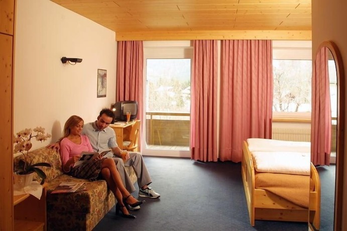 Imagen de la habitación del Hotel Dolomiten, Dobbiaco. Foto 14
