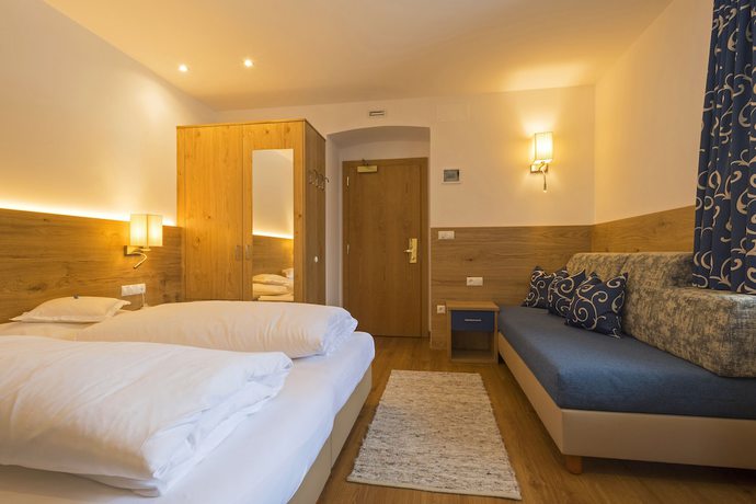Imagen de la habitación del Hotel Dolomiten, Dobbiaco. Foto 15