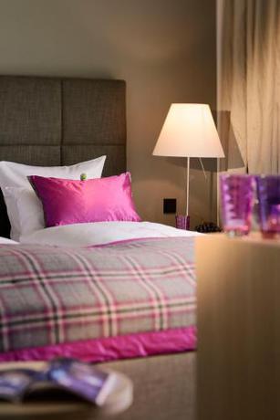 Imagen de la habitación del Hotel Dolomitengolf Suites. Foto 8