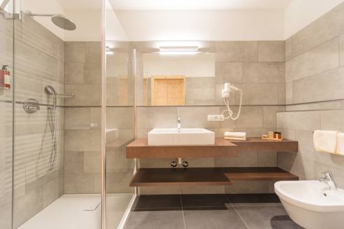 Imagen de la habitación del Hotel Dolomitenhof & Chalet Alte Post. Foto 7