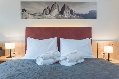 Imagen de la habitación del Hotel Dolomitenhof & Chalet Alte Post. Foto 8