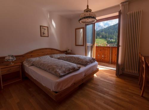 Imagen de la habitación del Hotel Dolomiti Cozzio. Foto 17