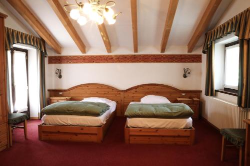 Imagen de la habitación del Hotel Dolomiti Cozzio. Foto 19