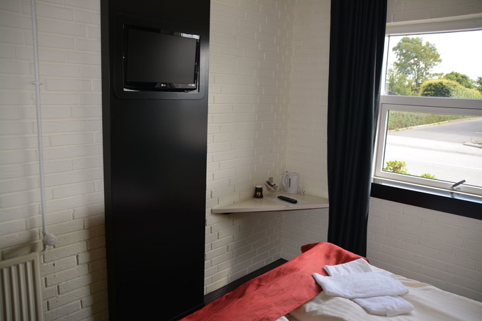 Imagen de la habitación del Hotel Dolphin Annex. Foto 11