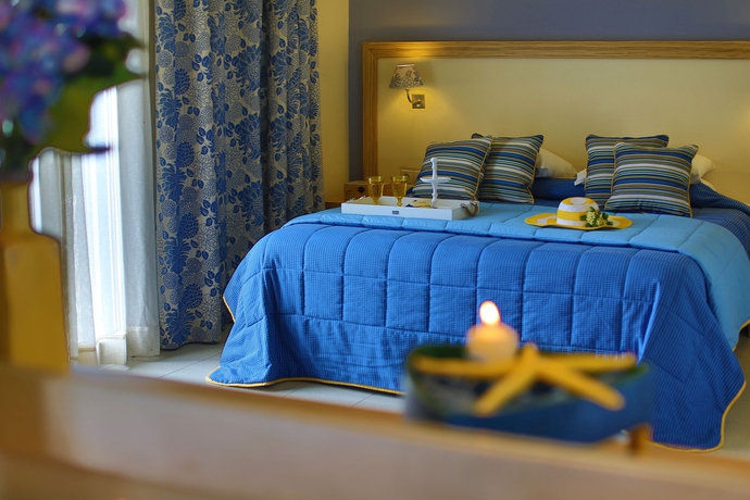 Imagen de la habitación del Hotel Dolphin Bay Seaside Resort & Suites. Foto 5