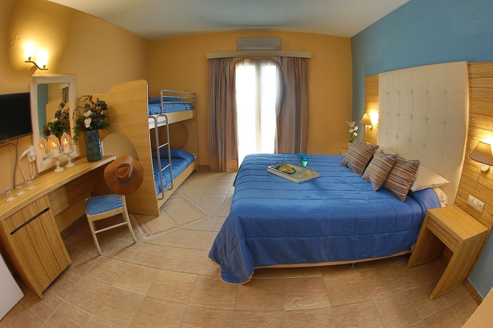 Imagen de la habitación del Hotel Dolphin Bay Seaside Resort & Suites. Foto 6