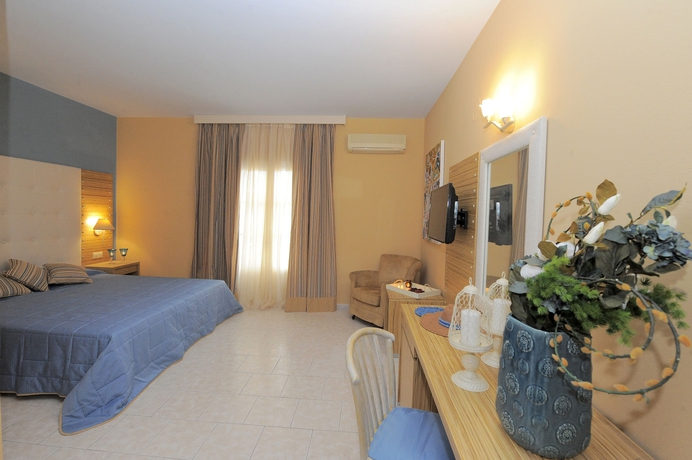 Imagen de la habitación del Hotel Dolphin Bay Seaside Resort & Suites. Foto 8