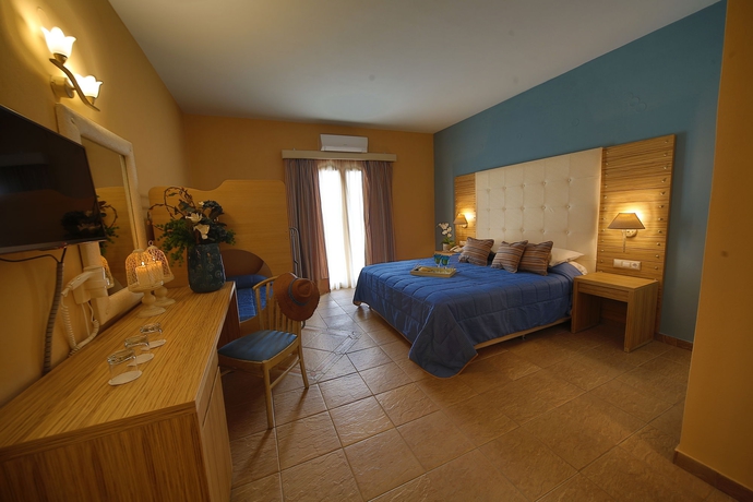 Imagen de la habitación del Hotel Dolphin Bay Seaside Resort & Suites. Foto 11