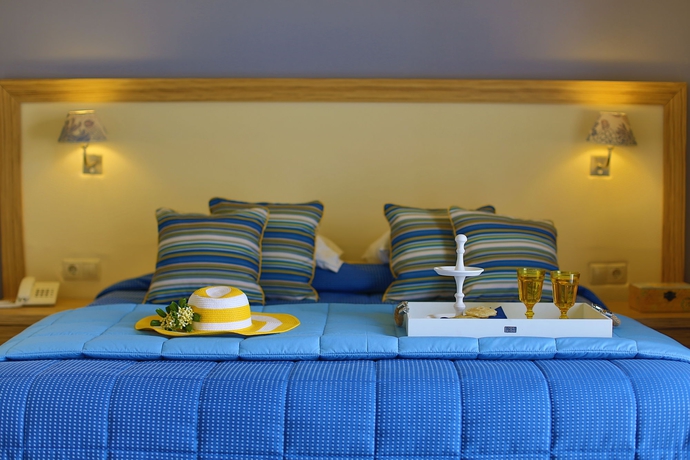 Imagen de la habitación del Hotel Dolphin Bay Seaside Resort & Suites. Foto 14