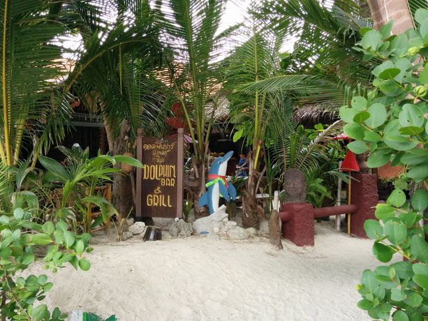 Imagen del bar/restaurante del Hotel Dolphin Bungalows. Foto 5