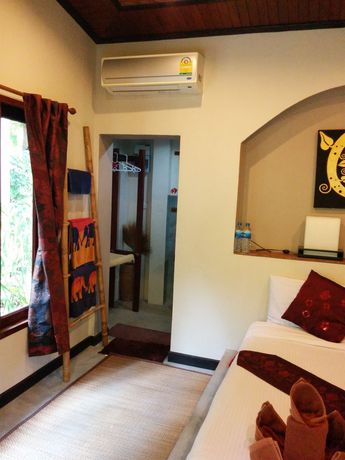 Imagen de la habitación del Hotel Dolphin Bungalows. Foto 11