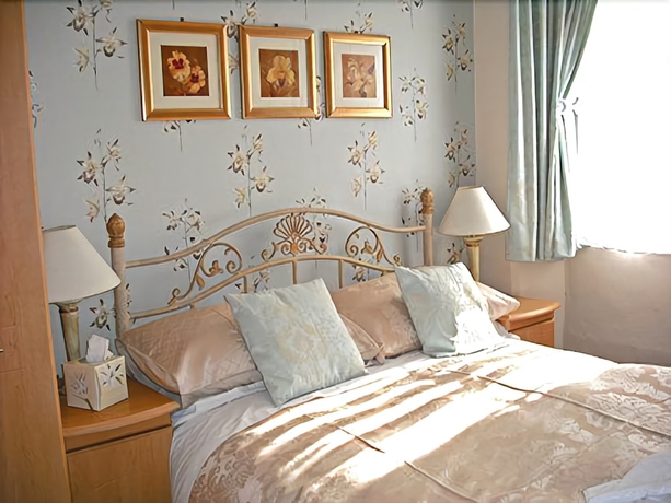 Imagen de la habitación del Hotel Dolphin Guest House. Foto 11