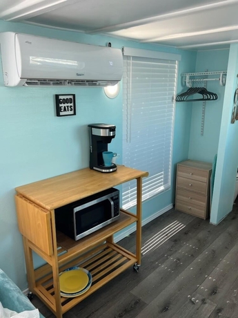 Imagen de la habitación del Hotel Dolphins Vacation Rental. Foto 15
