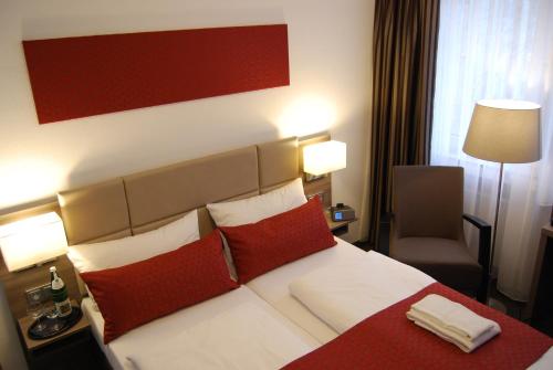 Imagen de la habitación del Hotel Dom Am Römerbrunnen. Foto 5