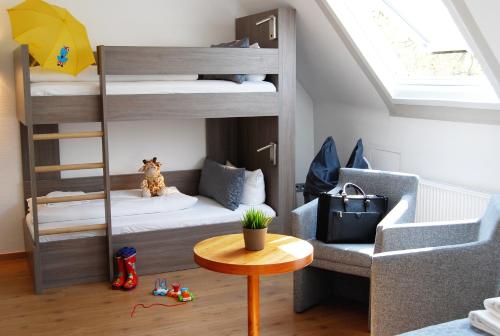 Imagen de la habitación del Hotel Dom Am Römerbrunnen. Foto 7