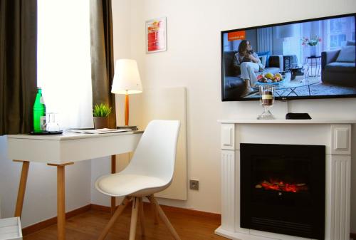 Imagen general del Hotel Dom Am Römerbrunnen. Foto 3