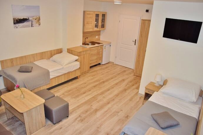 Imagen de la habitación del Hotel Dom Goscinny Matex. Foto 20