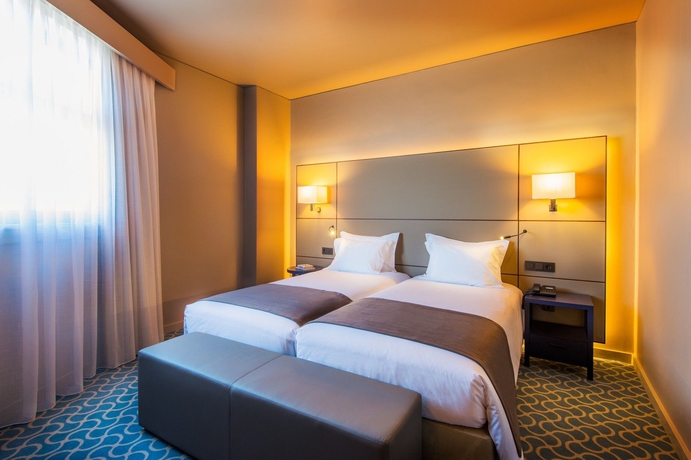 Imagen de la habitación del Hotel Dom Henrique Downtown. Foto 4