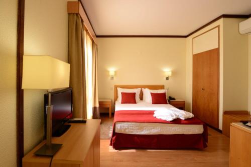 Imagen de la habitación del Hotel Dom Nuno. Foto 16