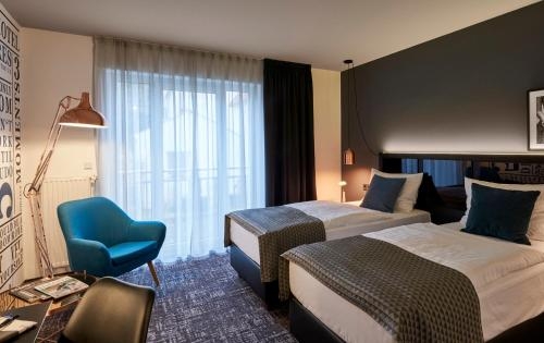 Imagen de la habitación del Hotel Dom, Osnabruck. Foto 10