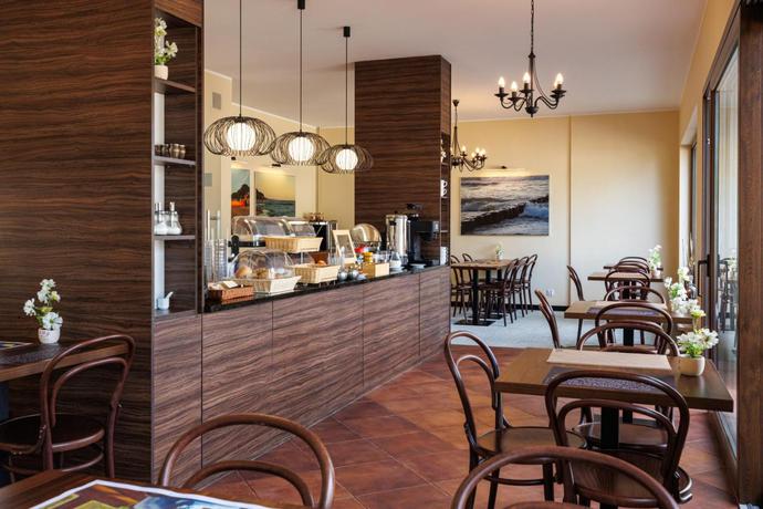 Imagen del bar/restaurante del Hotel Dom Wczasowy Plaża. Foto 2