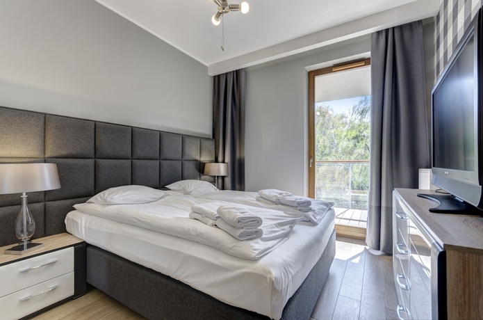 Imagen de la habitación del Hotel Dom & House - Apartamenty Nadmorski Dw&oacute;r. Foto 11