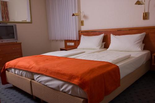 Imagen de la habitación del Hotel Dom-Hotel. Foto 6