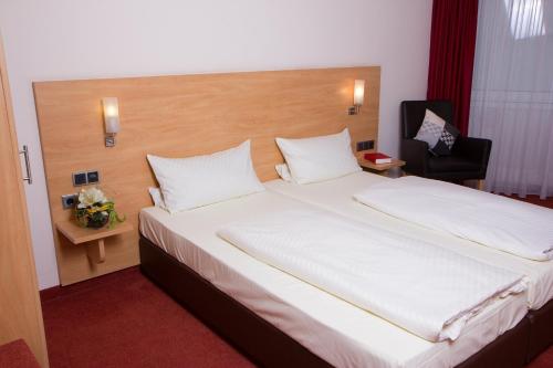 Imagen de la habitación del Hotel Dom-Hotel. Foto 8