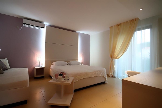 Imagen de la habitación del Hotel Domador Rooms and Apartments. Foto 2