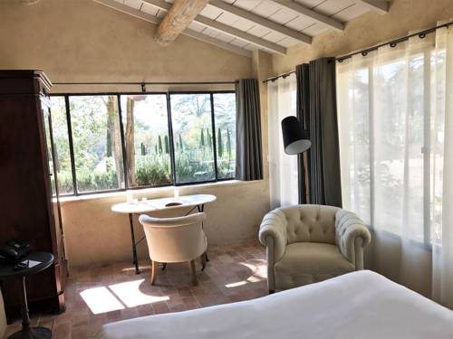 Imagen de la habitación del Hotel Domaine De Fontenille. Foto 6