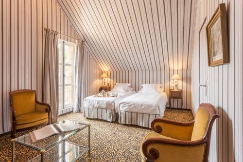 Imagen de la habitación del Hotel Domaine De La Groirie - Le Mans. Foto 10