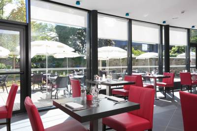 Imagen del bar/restaurante del Hotel Domaine De Pont Aven Art Gallery Resort. Foto 4