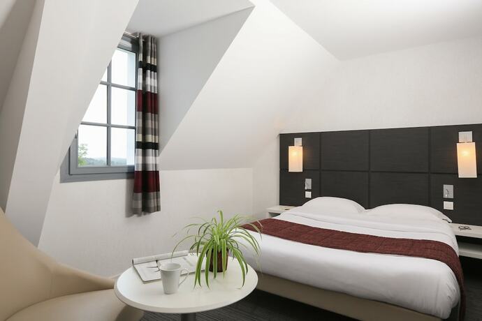 Imagen de la habitación del Hotel Domaine De Pont Aven Art Gallery Resort. Foto 18