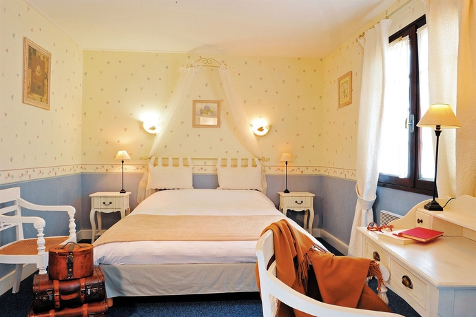 Imagen de la habitación del Hotel Domaine De Roullet. Foto 5