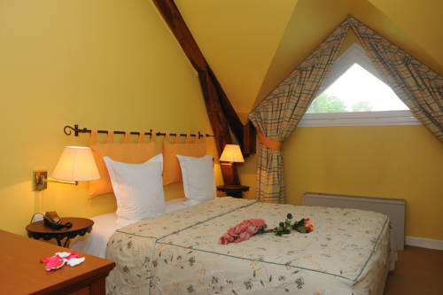 Imagen de la habitación del Hotel Domaine De Valaudran. Foto 8