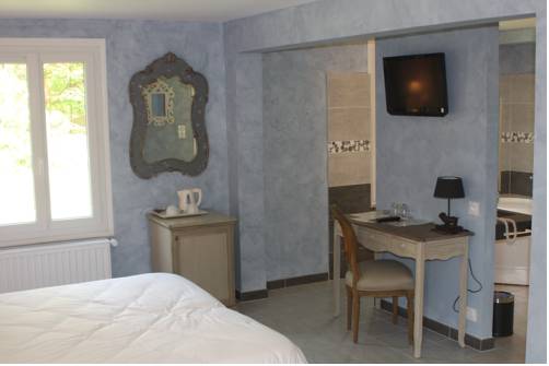 Imagen de la habitación del Hotel Domaine De Valaudran. Foto 13
