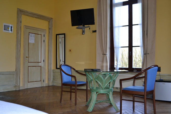 Imagen de la habitación del Hotel Domaine Du Château De La Neuville. Foto 9