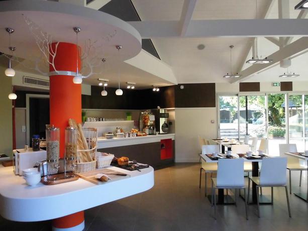 Imagen del bar/restaurante del Hotel Domaine Du Moulin Cavier. Foto 2