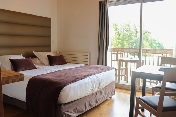 Imagen de la habitación del Hotel Domaine Du Normandoux. Foto 4