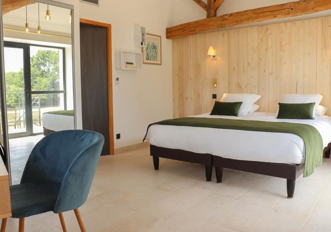 Imagen de la habitación del Hotel Domaine Du Normandoux. Foto 7