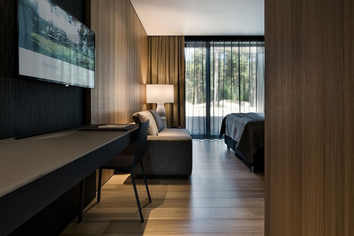 Imagen de la habitación del Hotel Domaine La Butte Aux Bois. Foto 11